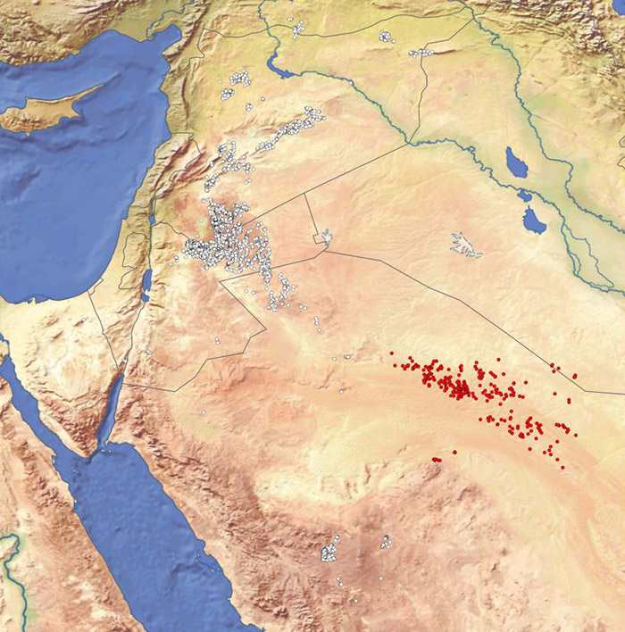 Newly found hunting lodges in the Nefud desert are shown by the red dots, while previously known desert kites in the Levant are represented by the white dots. (Credit: Feadley, et al. / EAMENA)