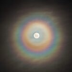 Origin of the Moon's colored rings, corona