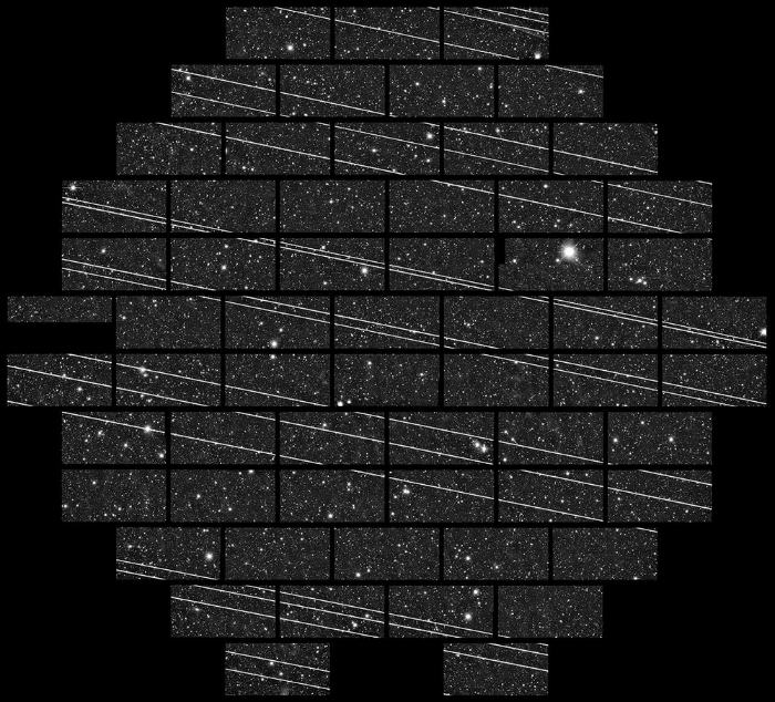 Streaks of light from 19 Starlink satellites captured by the four-meter telescope at the Cerro Tololo Inter-American Observatory.