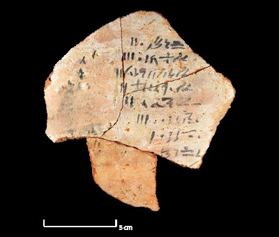 Ceramic shard with the names of workers involved in the construction of the funerary temple of the high priest Amenhotep.