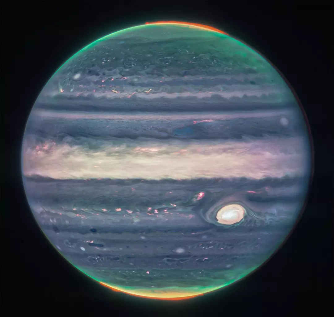 In this image of Jupiter taken by the James Webb telescope, you can observe the auroras at the poles of the planet.