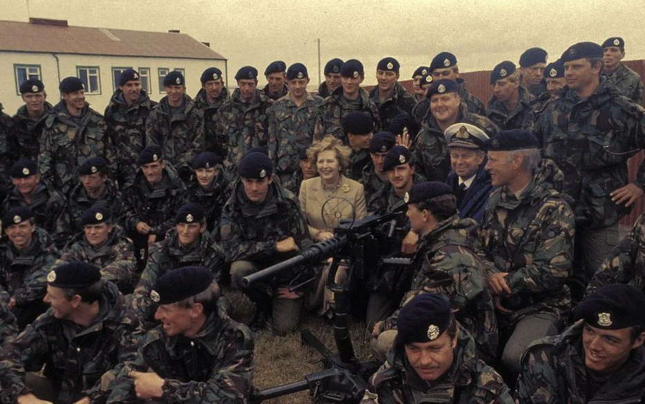 Margaret Thatcher with troops in the Falklands
