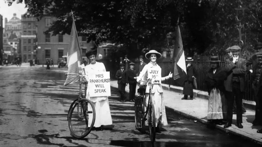 In July of 1914, Suffragettes announce a gathering at which Emmeline Pankhurst would be a featured speaker.