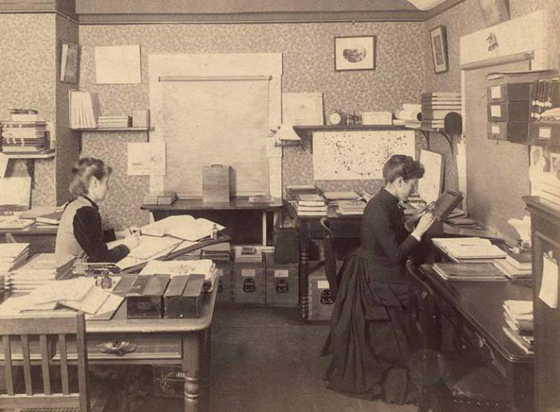  Harvard College Observatory, Fleming is examining a glass plate.