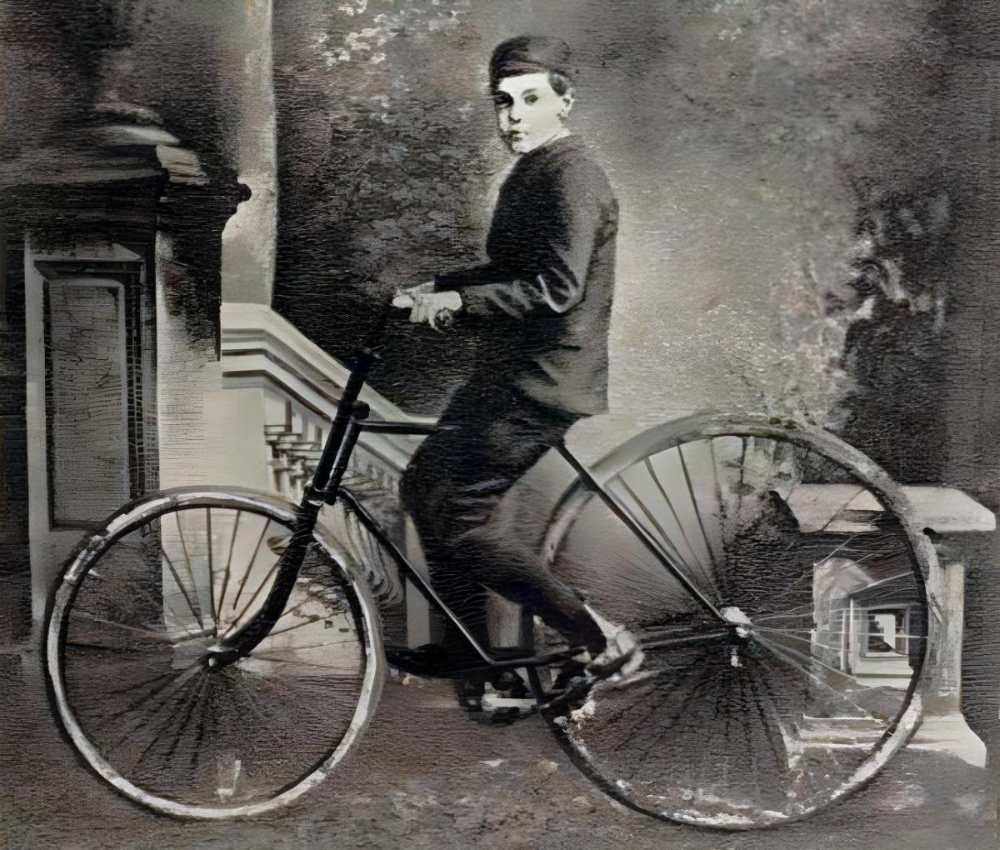 The first bicycle to use pneumatic tires, with Dunlop's son, 1888.