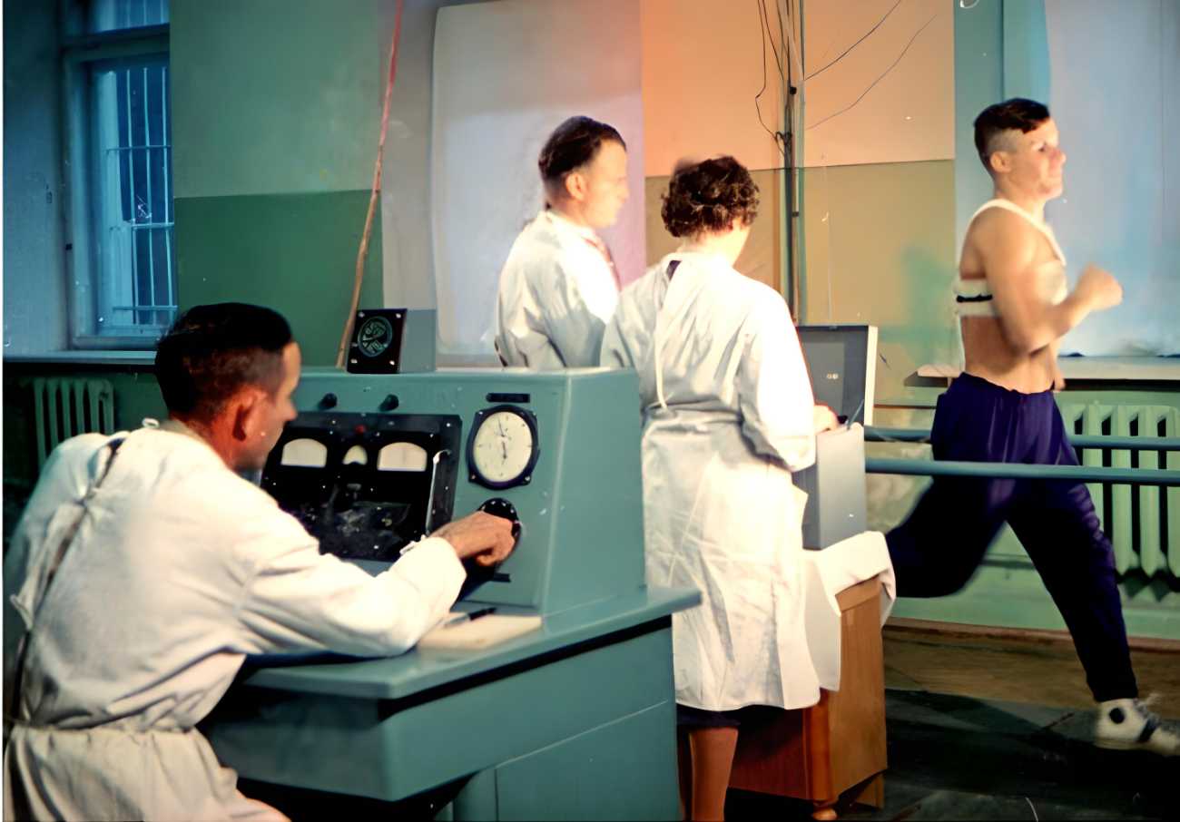 Gagarin prepares for his space voyage by running on a treadmill.