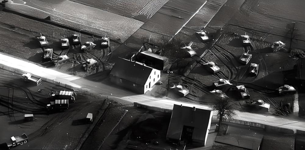 Within a few hours the crew could give the appearance there were dozens of military equipment working in an area. Using bulldozers, they would rip up the ground to make what looked like tank treads, and they would leave abandoned wooden buildings in places that would later be painted to seem like military ammunition storage facilities.