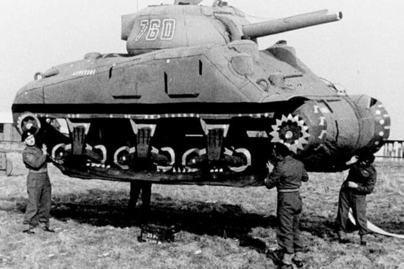 Ghost Army troopers from the 23rd Headquarters Special Troops transport an inflatable tank. In WWII, members of the Ghost Army used a wide range of creative deception strategies to confuse the enemy.