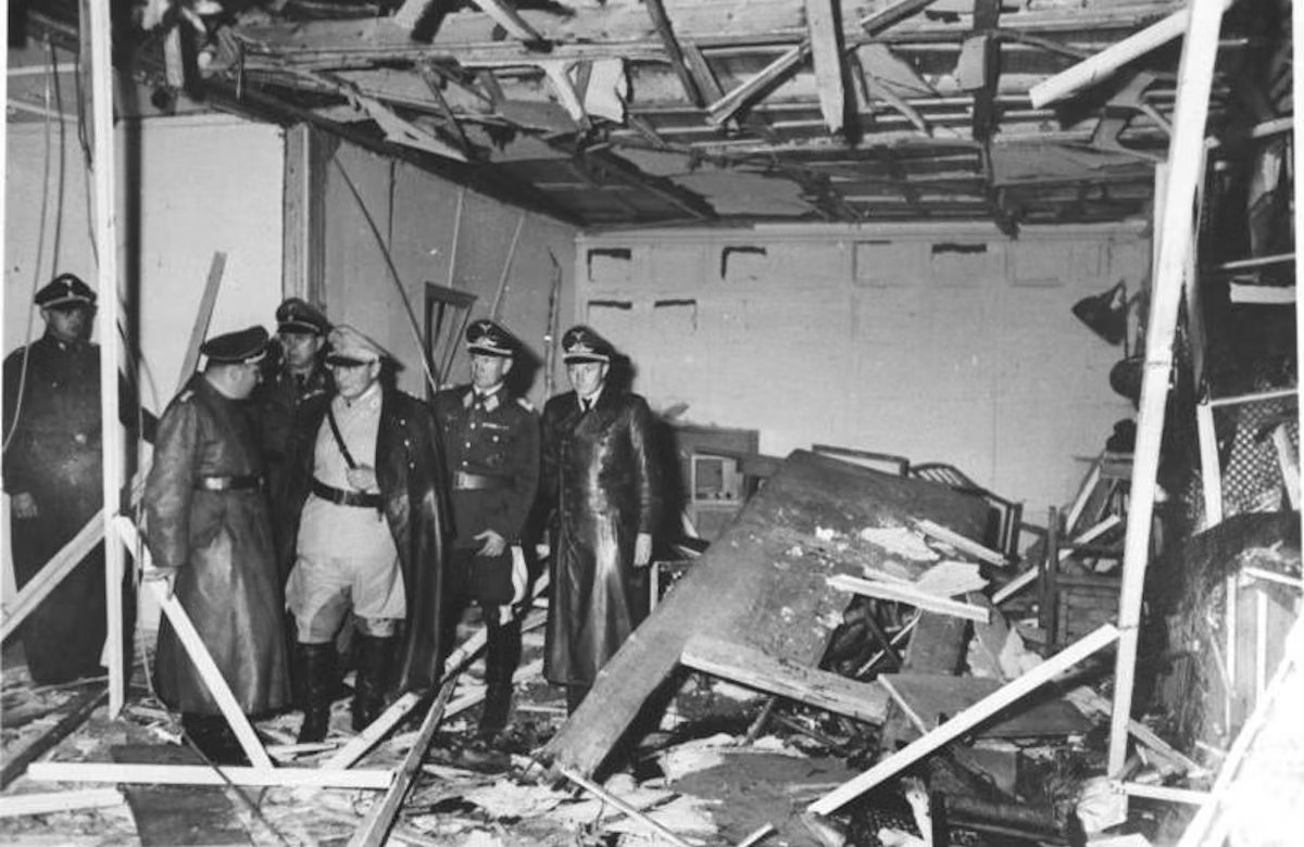 Martin Bormann, Hermann Göring, and Bruno Loerzer surveying the damaged conference room