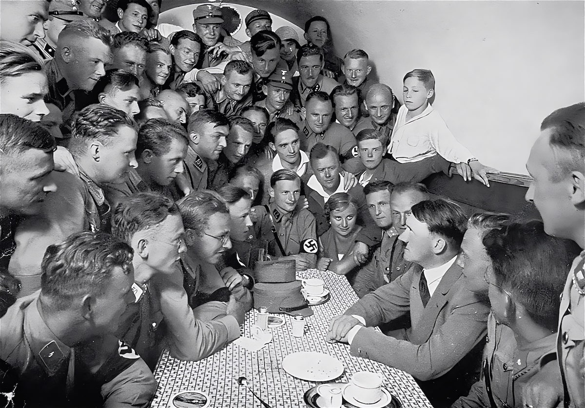 Hitler speaks to a crowd of enthralled Nazi stormtroopers and other followers at the Nazi Party’s headquarters in Munich.