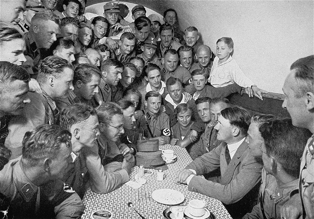 Hitler speaks to a crowd of enthralled Nazi stormtroopers and other followers at the Nazi Party’s headquarters in Munich