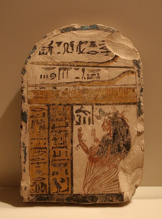 Stela with a woman adoring Meretsenger. 