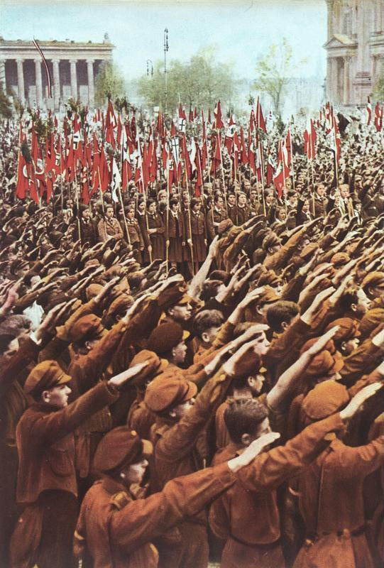 Hitler Youth members give the Nazi salute at a rally at the Lustgarten in Berlin, 1933.