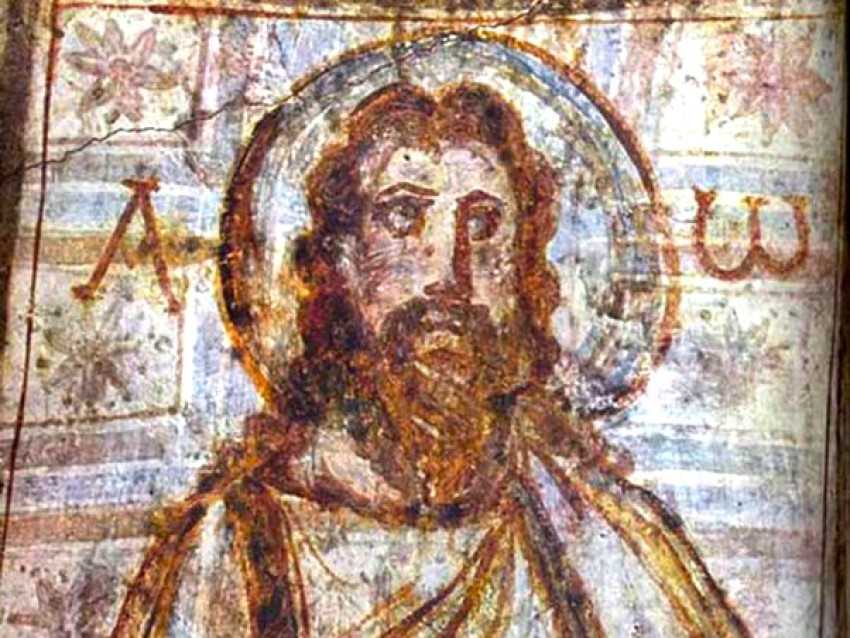 The Catacombe di Commodilla near Rome, dating to the 4th century AD, depicts Jesus with long hair, a beard, and southern European facial features.