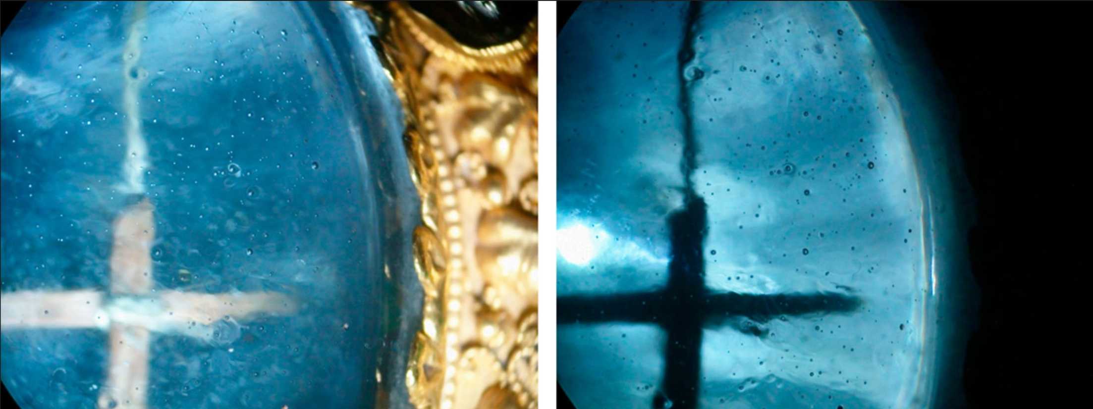 The True Cross inside the Talisman of Charlemagne. The glass cabochon is filled with air bubbles, visible in both reflected and transmitted light (left and right, respectively). The wooden cross and silk thread can be seen clearly in both pictures.