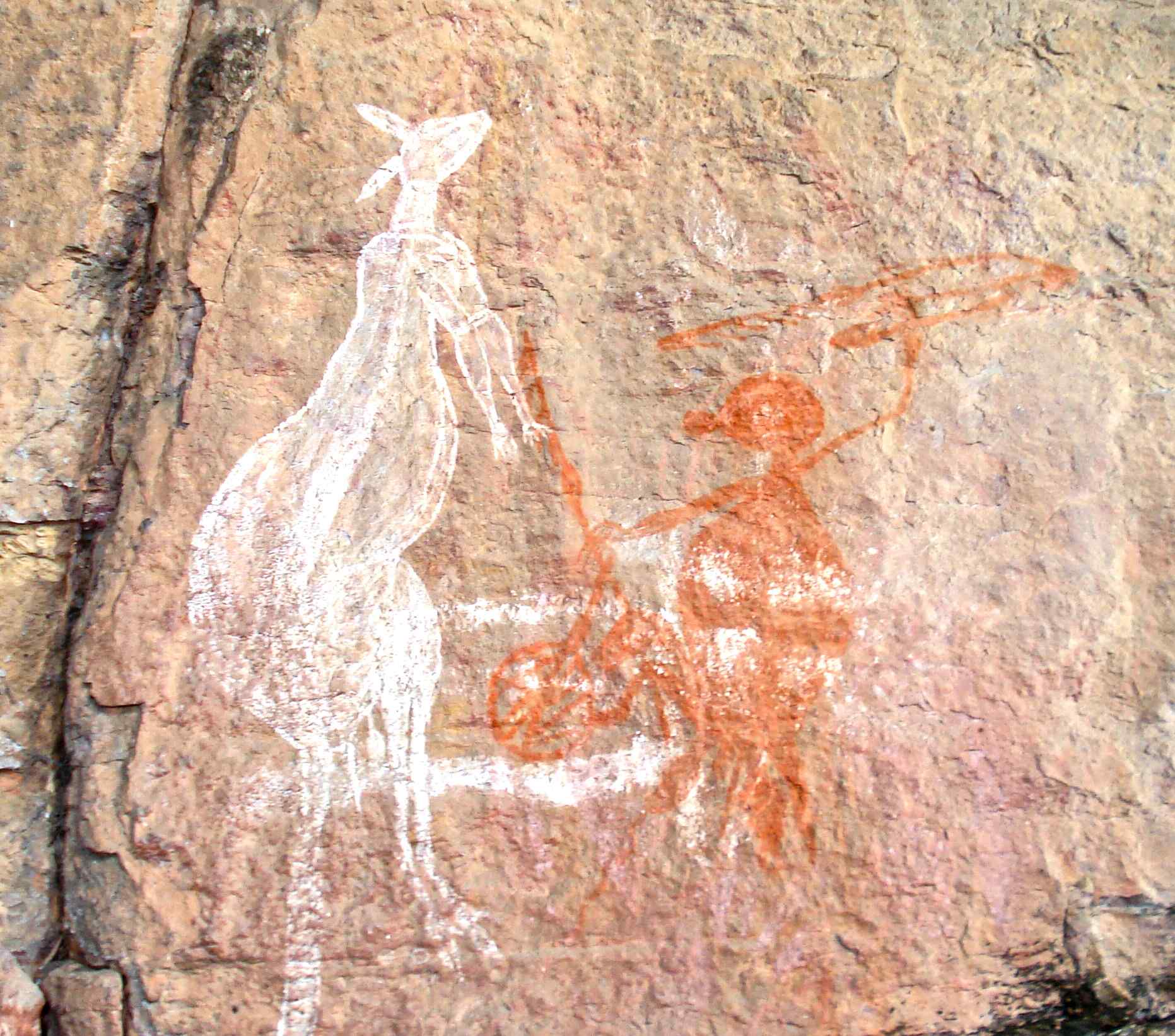 A work of rock art about the handling of the atlatl. Anbangbang Rock Shelter, Kakadu Park, Northern Australia.