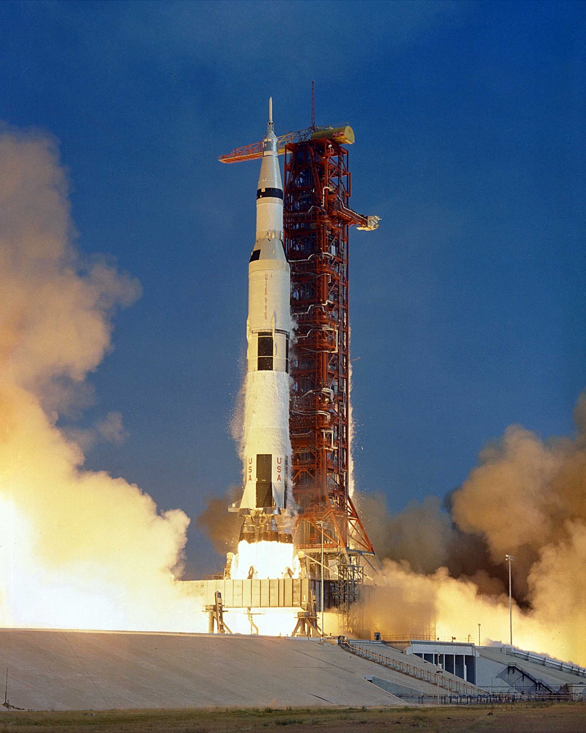 The Apollo 11 Saturn V rocket launch vehicle lifts-off with astronauts Neil A. Armstrong, Michael Collins and Edwin E. Aldrin, Jr., at 9:32 a.m. EDT July 16, 1969, from Kennedy Space Center's Launch Complex Pad 39A.