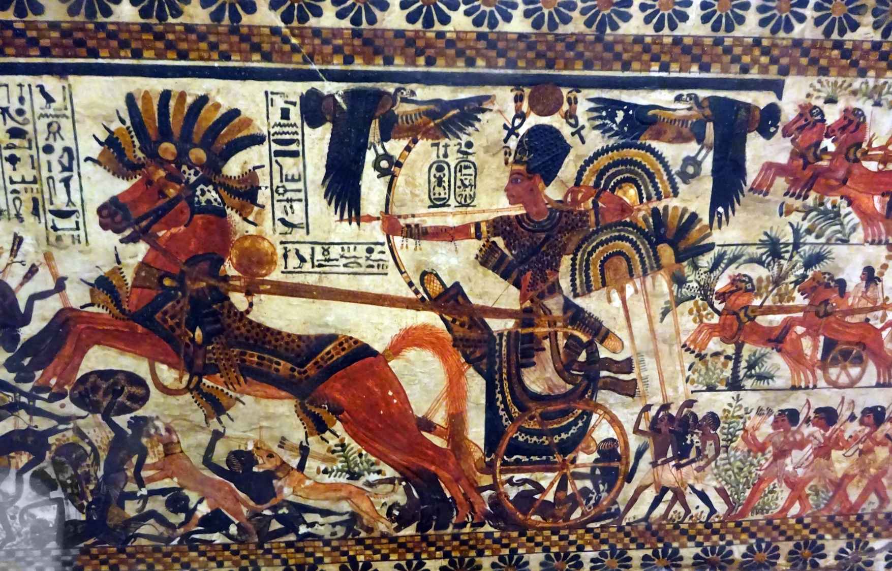 Tutankhamun (r. 1333–1323 BC) on a war chariot with spoked vehicles.