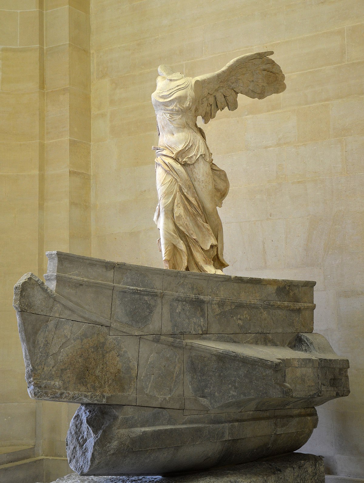 The "Winged Victory of Samothrace" sculpture in the Louvre. The sculpture was an inspiration for the Worker and Kolkhoz Woman. 