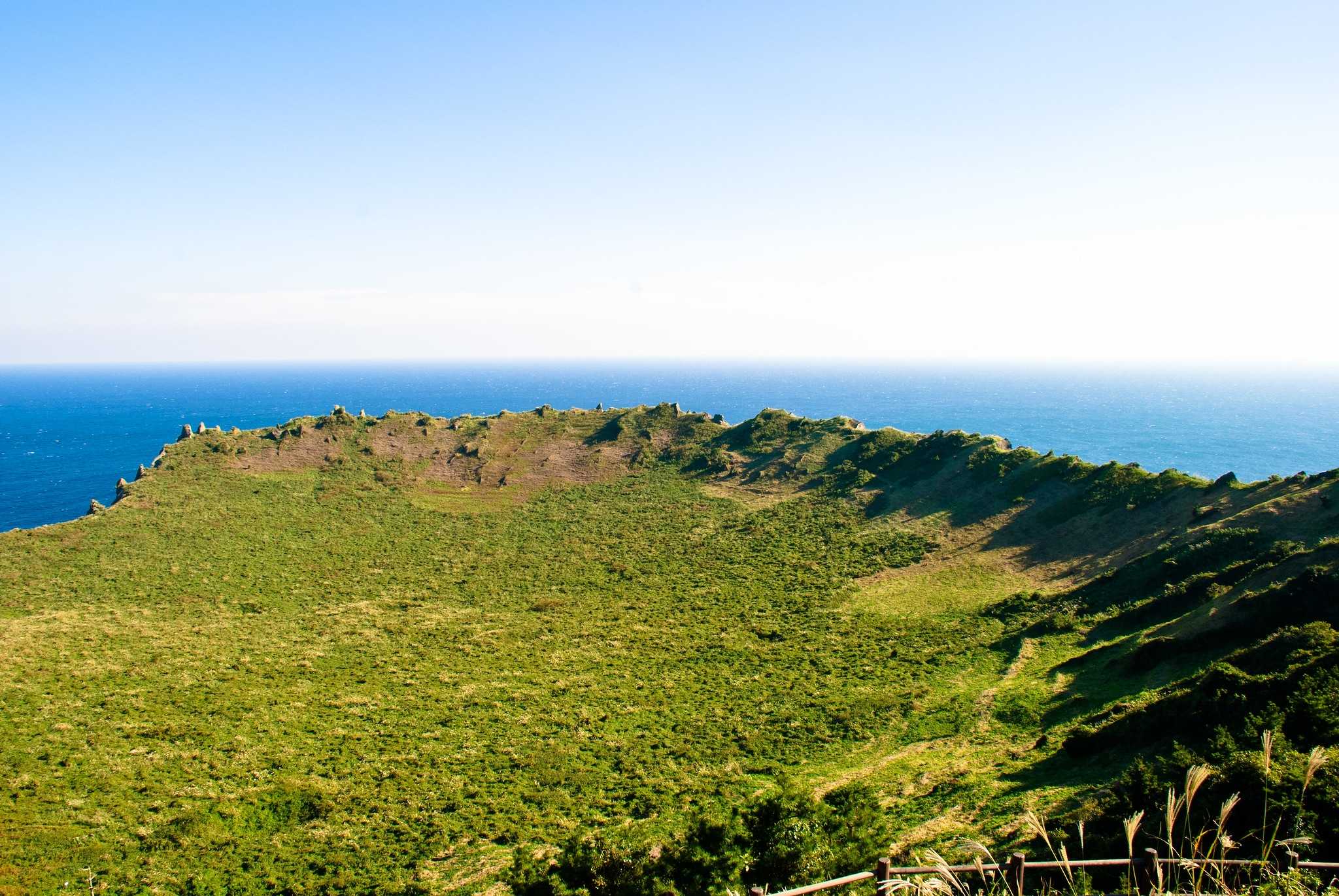 Seongsan Ilchulbong's peak, caldera, and vegetation.