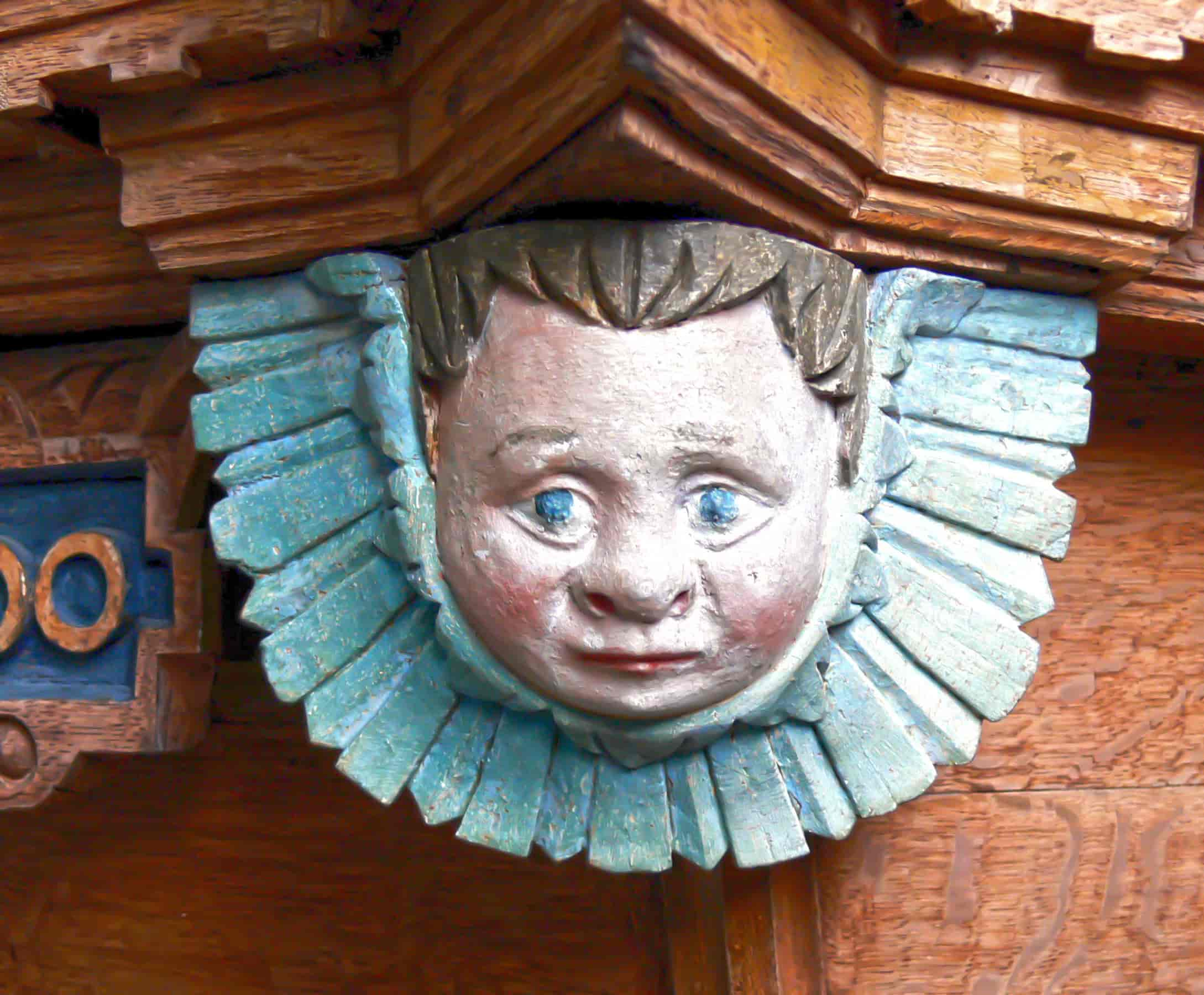 the protome of an Angel's head, Ballum church, Pulpit (1600)