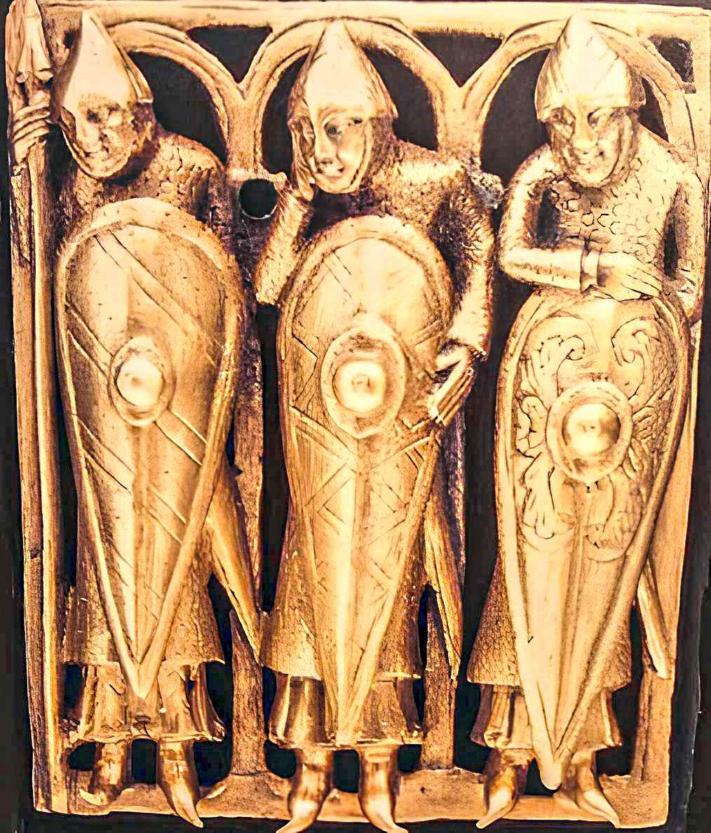 The kite shield of the sleeping soldiers of the Temple Pyx with shield bosses. A mid-12th-century medieval bronze gilt plaque.