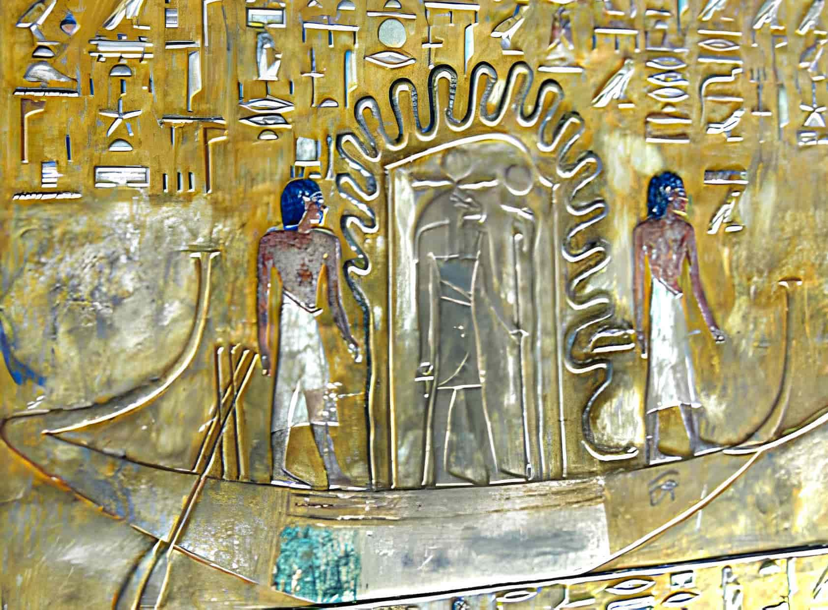 Ra traveling through the underworld in his solar barque while protected by the snake Mehen. From Seti I's tomb.