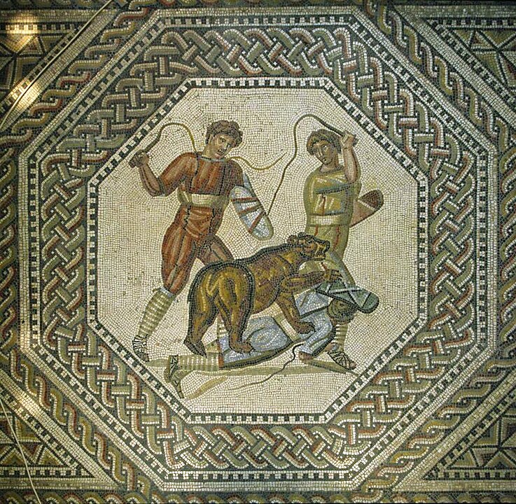 A bear devours a man. Roman mosaic.