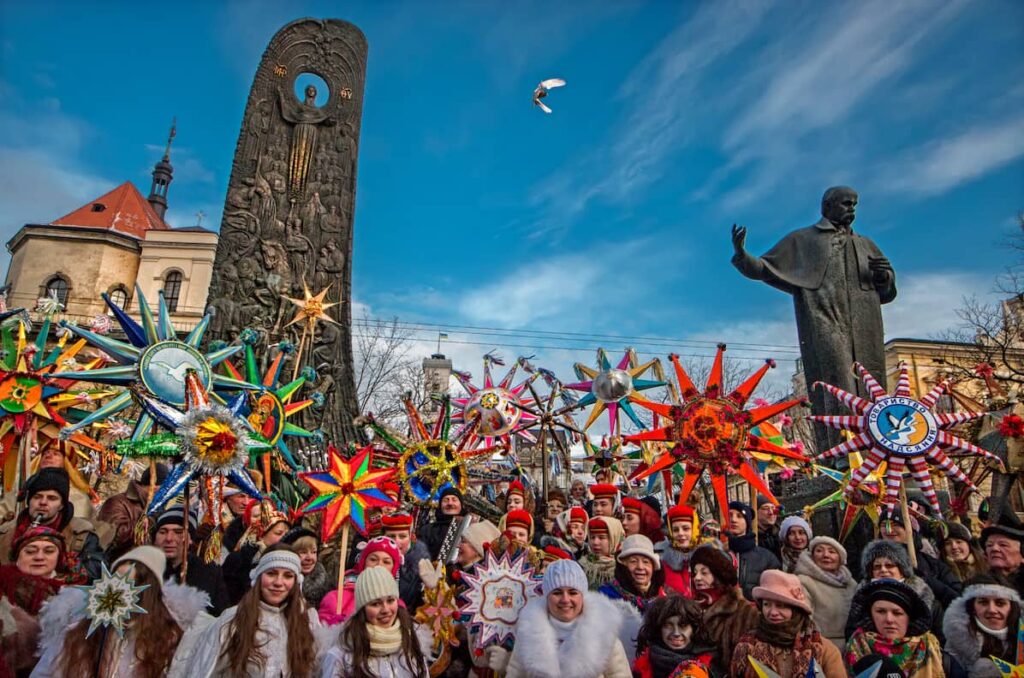 Ukrainians in Lviv celebrate Christmas with Koliada festival and Christmas stars.