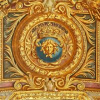 On the ceiling of the Hall of Mirrors at the Palace of Versailles. Nec pluribus impar