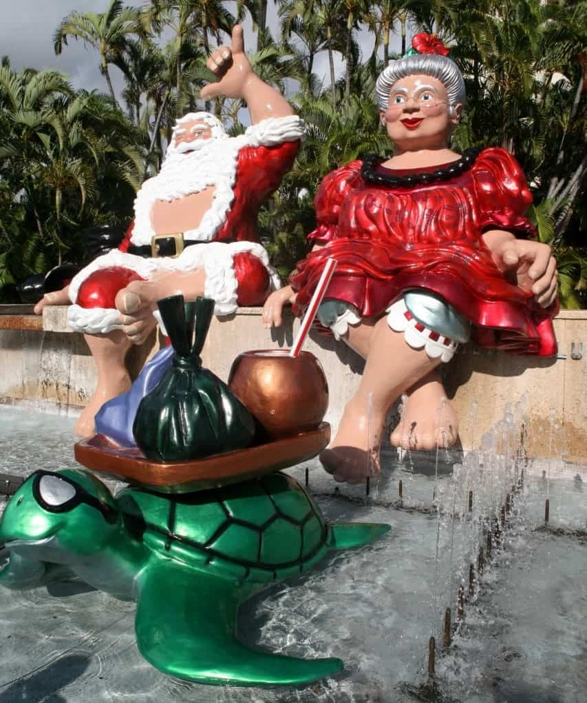 "Shaka Santa" with Tutu Mele and Turtle with drinks. 