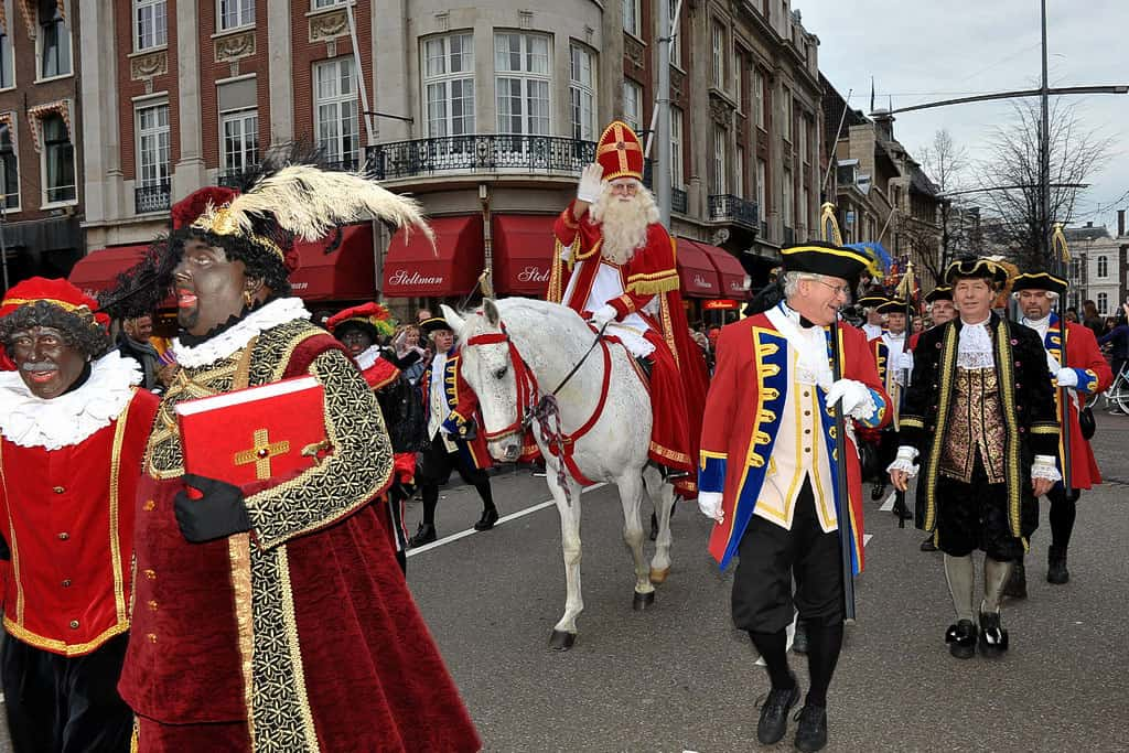 Sinterklaas and Zwarte Piet (left).