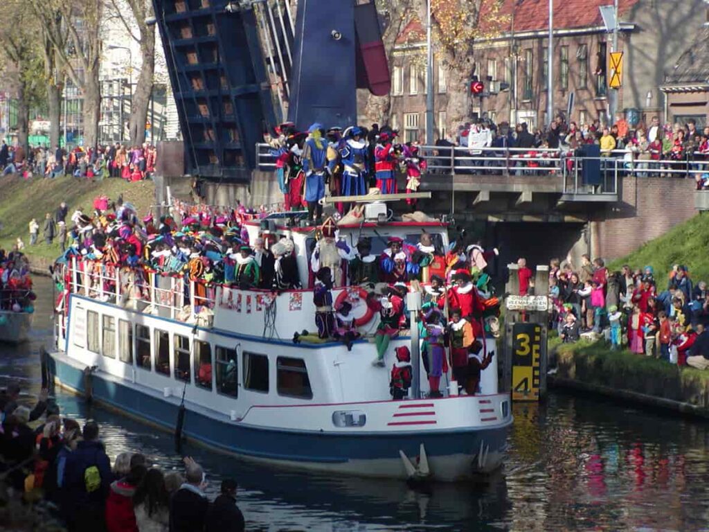 Saint Nicholas and Zwarte Piets arriving by boat, Netherlands.