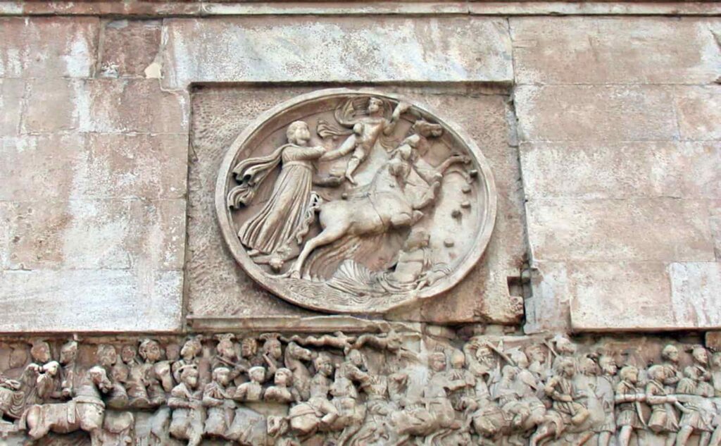 Oceanus lies on the waves, above him rises the Quadriga of Sol. Medallion on the eastern side wall of the Arch of Constantine, 315 AD On a corresponding medallion on the west side, Luna stands above him.