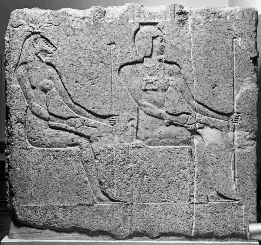 Fragment of a relief in granite red depicting the pharaoh Ptolemy II Philadelphus (282 BC - 246 BC), absent here, who worships Shu and the goddess Menhit. Walters Art Museum, Baltimore.