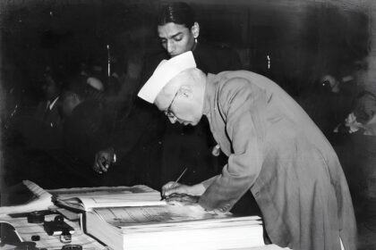 Nehru signing the Indian Constitution c.1950