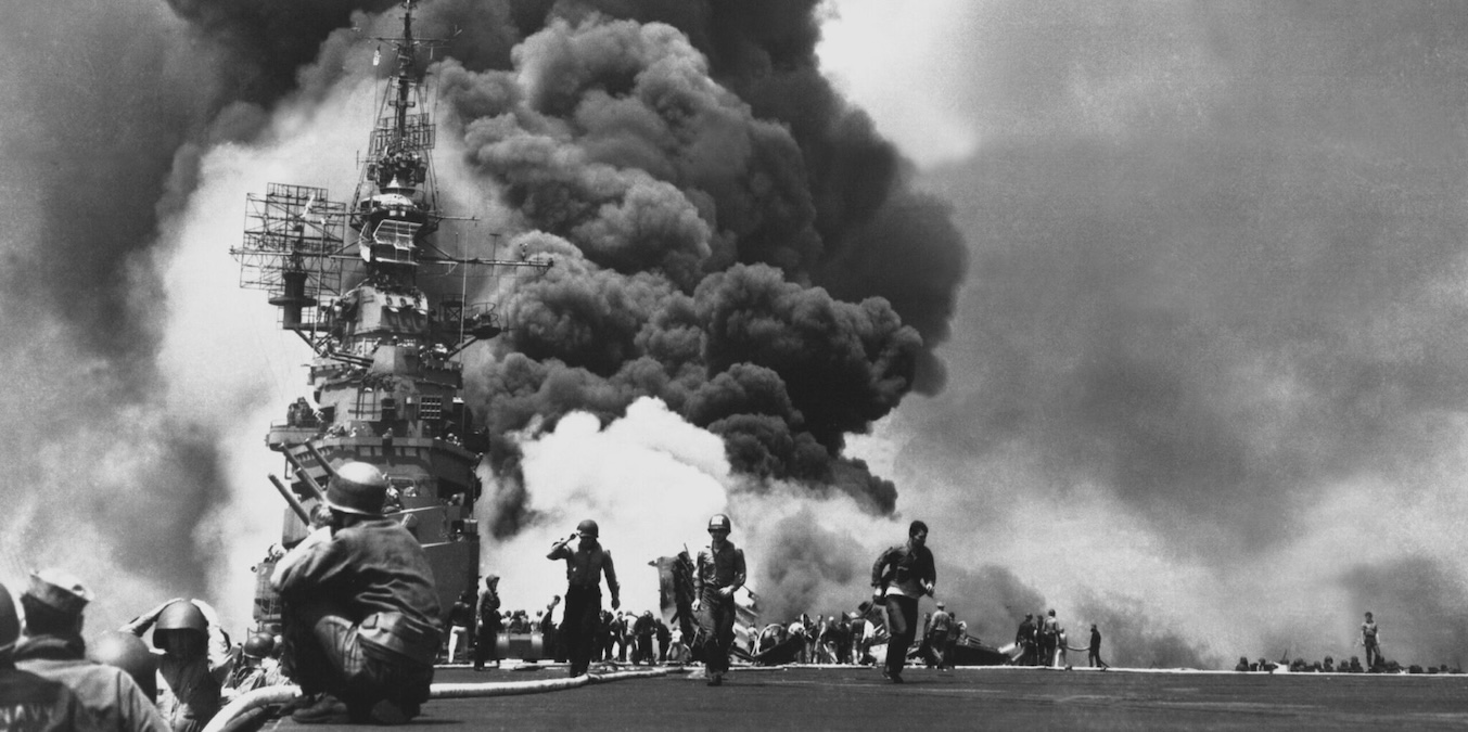 USS Bunker Hill (CV-17) afire after being hit by Kamikazes off Okinawa, 11 May 1945