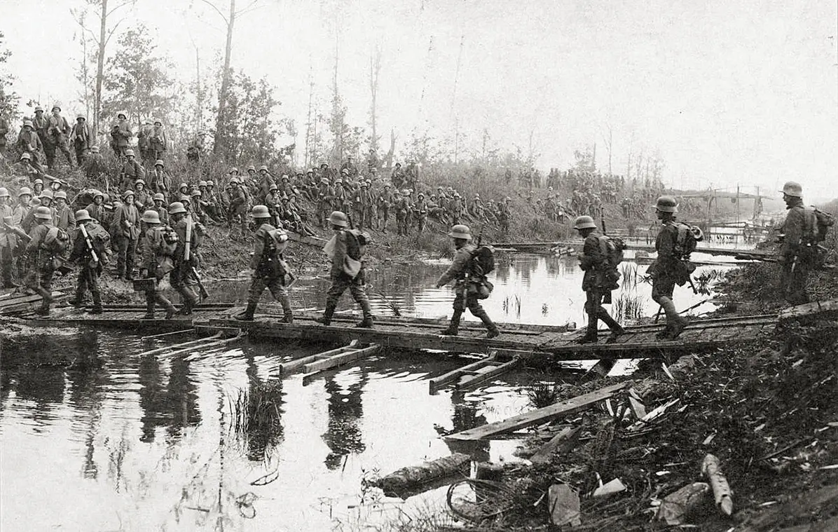 German infantrymen cross a canal on May 27, the first day of the battle